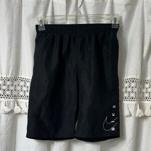 Nike Black Swim Shorts with White Swoosh and Vertical Logo